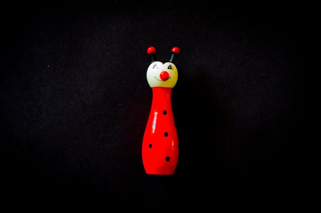 Photo of White and Red Ladybug Toy